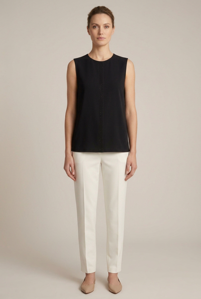 AI-generated full-body model wearing the black shimmer detail sleeveless top with ivory trousers