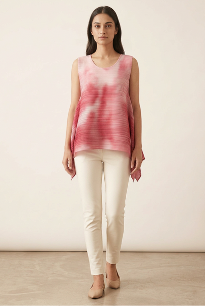 AI-generated model wearing the sleeveless pink pleated top with long draped side panels and ivory trousers