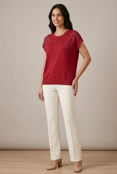 AI-generated full-body model in a three-quarter pose wearing the red Shimmer Shoulder Knit Top and ivory trousers