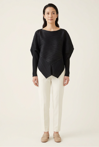 AI-generated model wearing the black asymmetric drape pleated top with ivory trousers